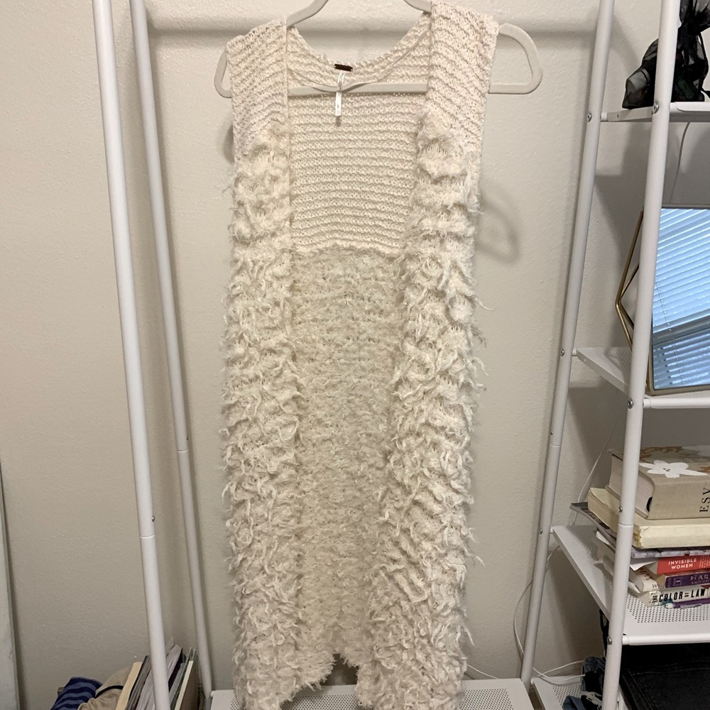 Long, bohemian, fuzzy vest!